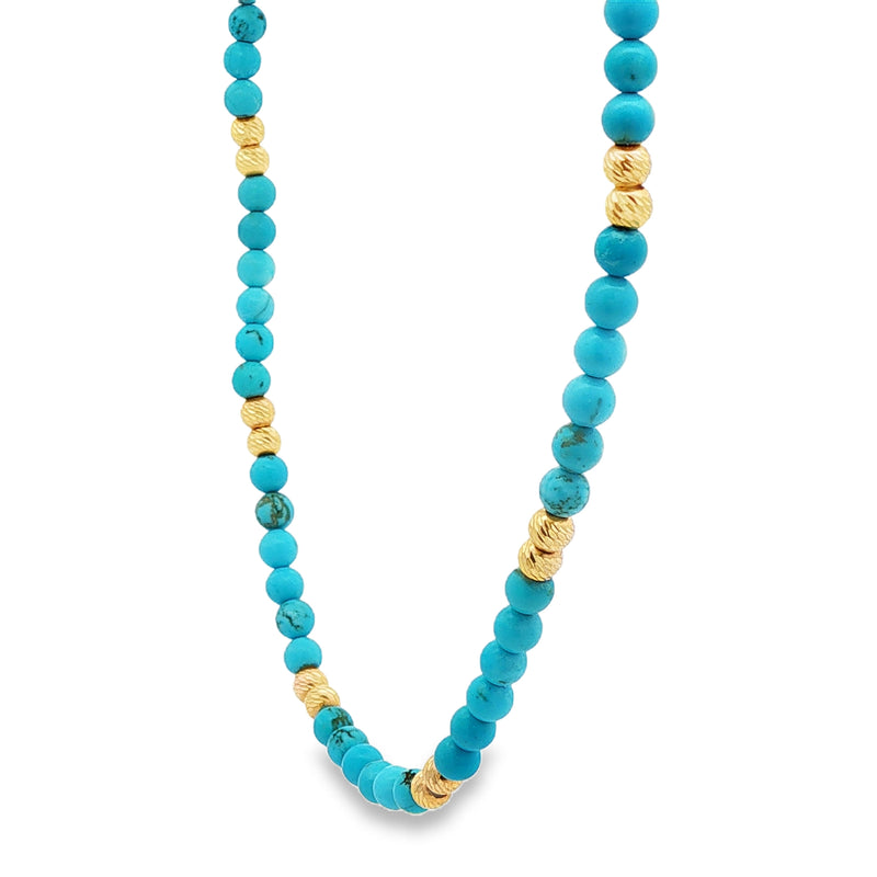 Turquoise bead necklace with textured gold spacer beads, vibrant blue and polished finish.