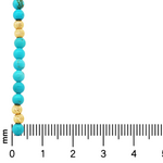 Turquoise and ribbed gold round beads strung in alternating pattern on gold chain.