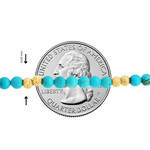 Turquoise beads with textured gold spherical beads necklace segment next to US quarter for scale.