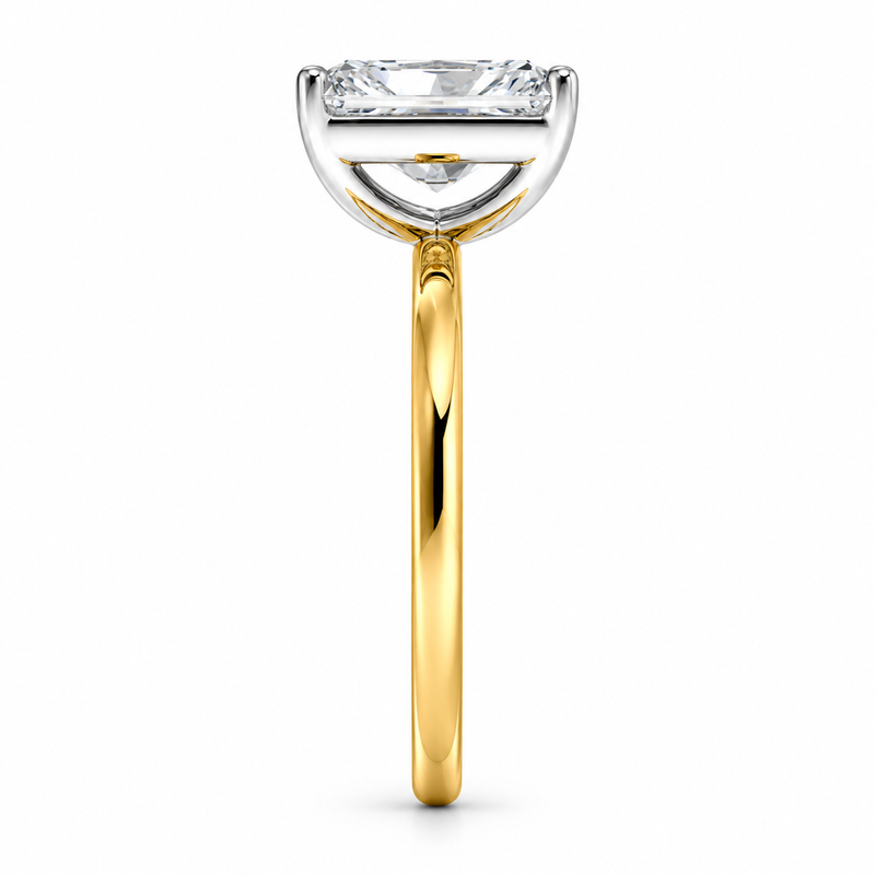 Two-tone 14K gold engagement ring featuring a 2 carat radiant-cut lab grown diamond with four white gold prongs and a polished gold band.