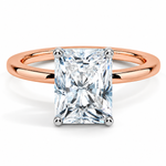 Two-tone 14K gold engagement ring featuring a 2 carat radiant-cut lab grown diamond with four white gold prongs and a polished rose gold band.
