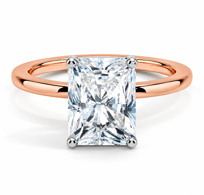 Two-tone 14K gold engagement ring featuring a 2 carat radiant-cut lab grown diamond with four white gold prongs and a polished rose gold band