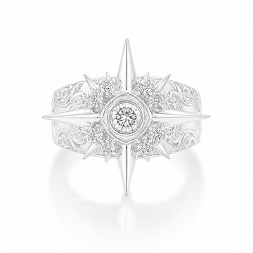 Silver diamond statement ring with elevated center stone framed by sculpted star points
