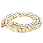 22-inch yellow gold tennis chain with upside down 75 pointer diamonds.