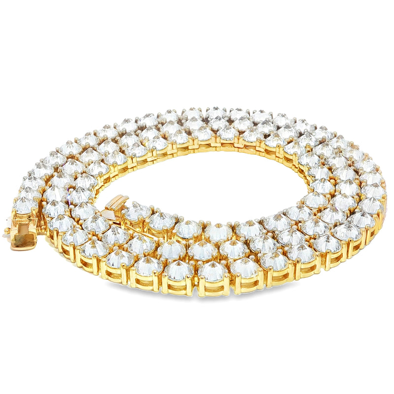 22-inch yellow gold tennis chain with upside down 75 pointer diamonds.