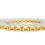 22-inch yellow gold tennis chain with upside down 75 pointer diamonds.