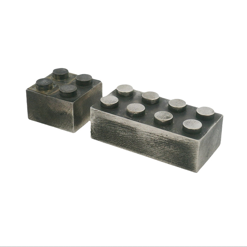 Silver TraxNYC Jesus pendant with blue diamond eyes on anchor cable chain.