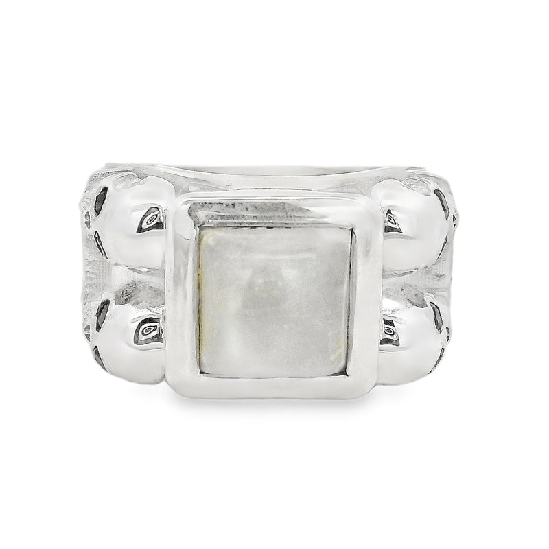 Silver ring with square moonstone center and skull designs on band