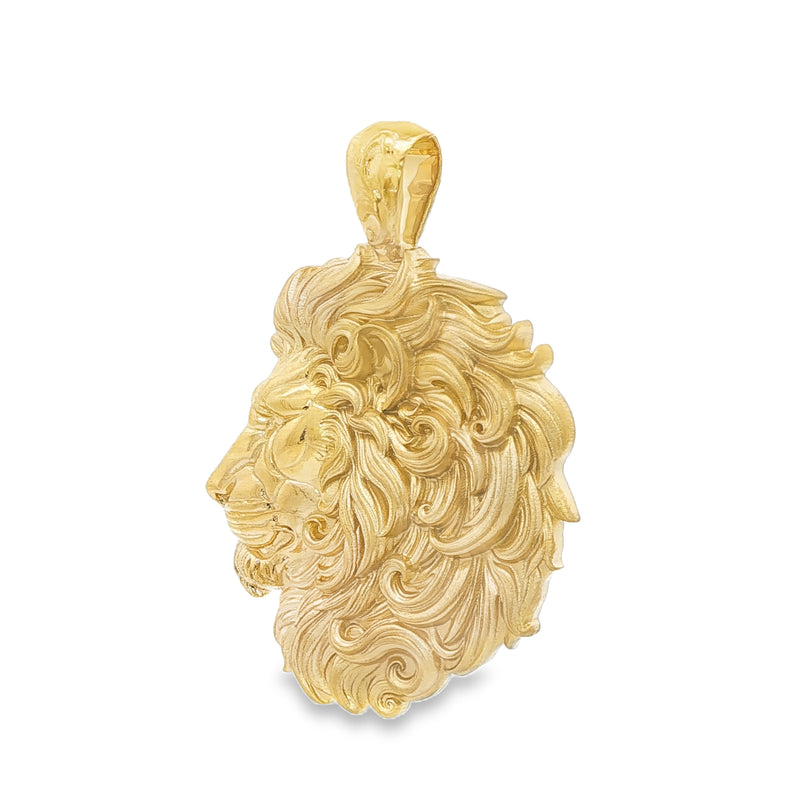 Yellow gold lion head pendant with intricate flowing mane details, polished finish.