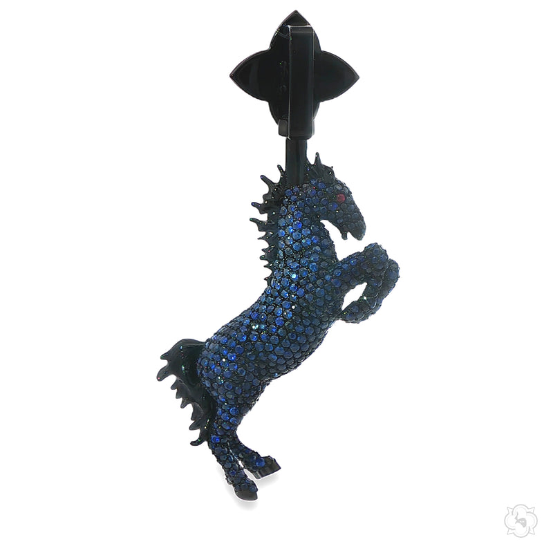 Black horse-shaped pendant encrusted with blue sapphires and diamond accents.