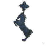 Men's horse-shaped pendant with blue sapphires and diamond accents on silver setting.