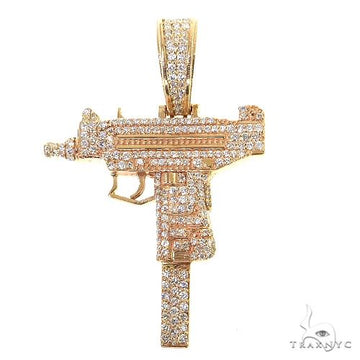 Yellow gold Uzi submachine gun pendant covered in sparkling diamonds, mens custom jewelry.