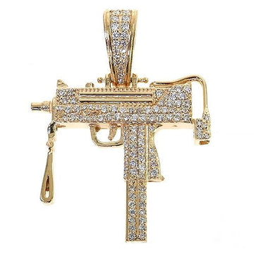 Yellow gold Uzi submachine gun pendant encrusted with sparkling diamonds and detailed accents.