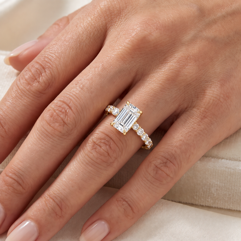 14K gold Engagement Ring featuring a 3.50 carat emerald-cut lab grown diamond with a slim double shared-prong diamond band.