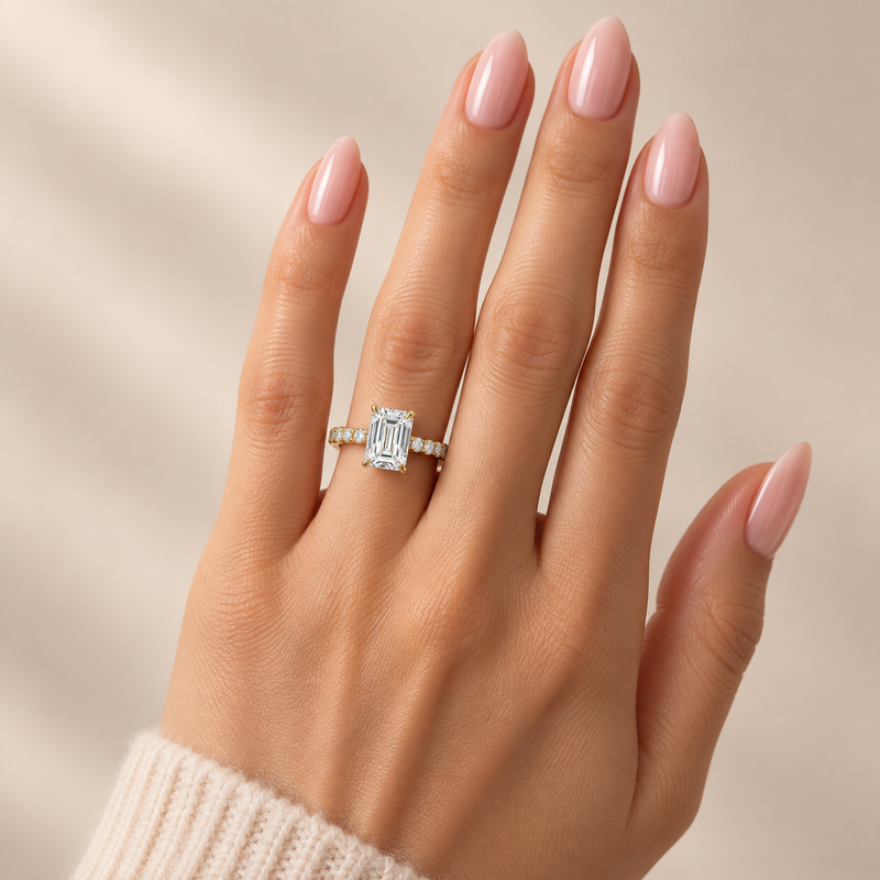 14K gold Engagement Ring featuring a 3.50 carat emerald-cut lab grown diamond with a slim double shared-prong diamond band.