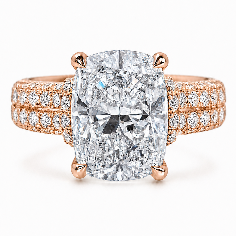 Rose gold engagement ring with large cushion-cut diamond and triple diamond halo band.