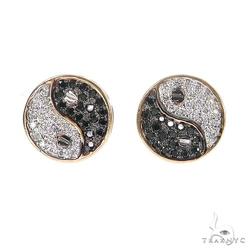 Round yin and yang stud earrings with black and white diamonds in rose gold setting