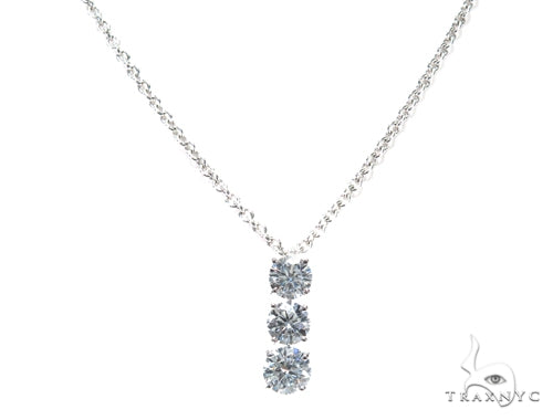 Diamond waterdrop necklace with prong-set round stones
