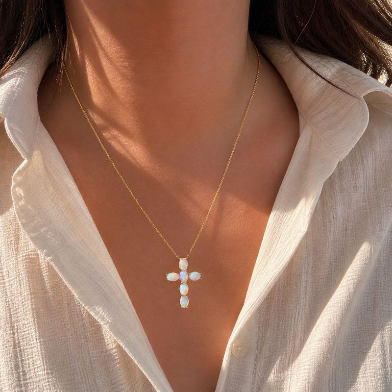 Mini spiritual cross pendant set with oval opal stones in prong settings