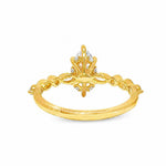 14k gold engagement ring with 1 ct marquise diamond and intricate filigree detailing.