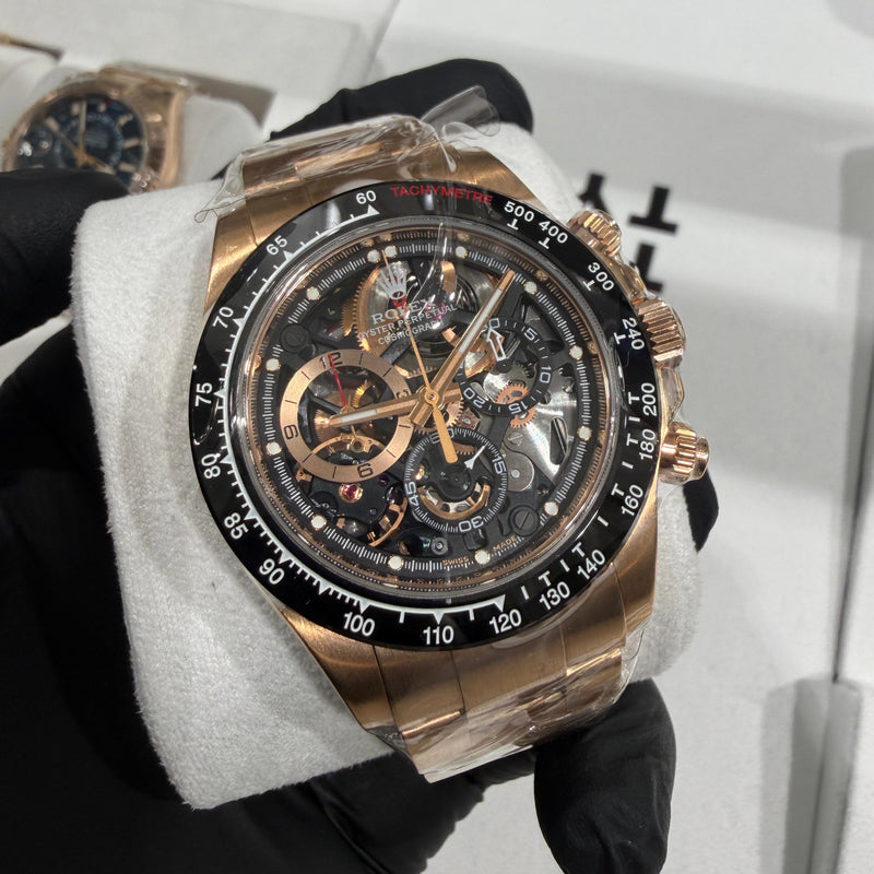Rolex Cosmograph Daytona 116515LN in 18K Everose Gold with a skeletonized dial and visible Caliber 4130 movement.


