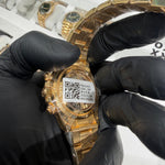 Complete pre-owned Rolex Cosmograph Daytona Le Mans 126525LN set, showing the 18K yellow gold watch with black panda dial alongside its Rolex guarantee card and accessories, emphasizing its collectible special-edition status.