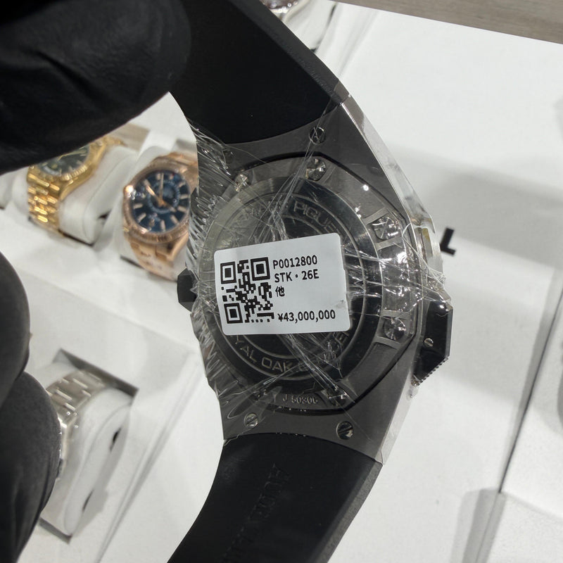 44mm Audemars Piguet Royal Oak Concept on a black rubber strap, highlighting the futuristic design and fully visible tourbillon movement.

