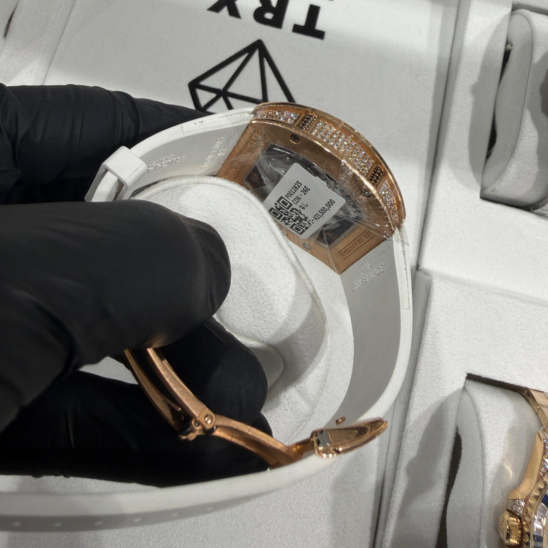 Richard Mille RM 023 on a white rubber strap, combining high jewelry craftsmanship with technical watchmaking.
