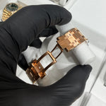 18K rose gold Audemars Piguet Royal Oak 41mm bracelet with blue tapisserie dial partially visible.