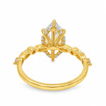 14K yellow gold ring with 2.5 Ct marquise diamond and intricate prong setting.