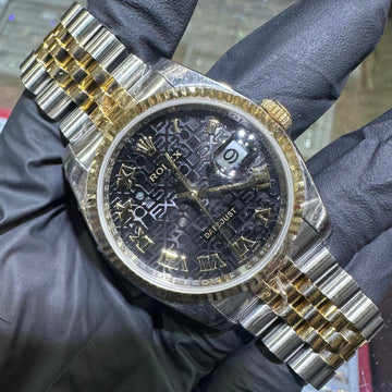 Rolex DateJust 36mm two-tone gold watch with black Roman numeral dial and jubilee bracelet.