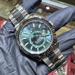 Rolex Sky-Dweller 42mm Oystersteel watch with mint green dial and fluted bezel.