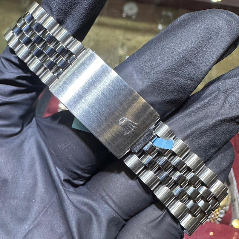 Rolex DateJust 36mm stainless steel Jubilee bracelet with brushed clasp and Rolex crown logo.