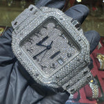 Cartier Santos 43mm stainless steel watch fully iced with diamond pave and Arabic numerals.