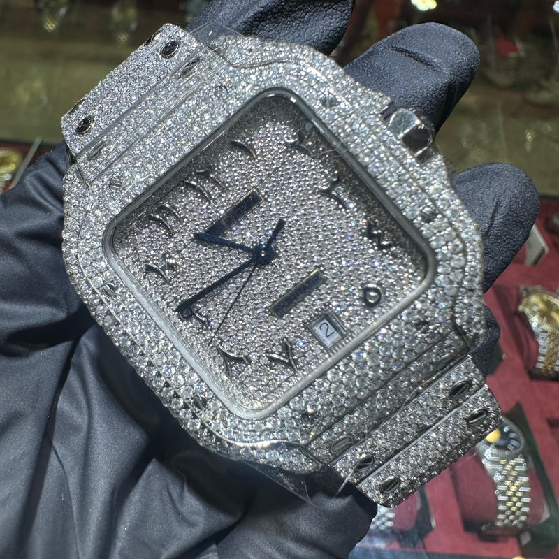 Cartier Santos 43mm stainless steel watch fully iced with diamond pave and Arabic numerals.