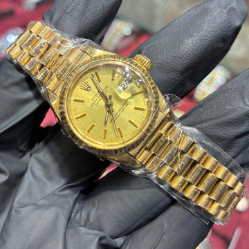 Rolex Lady-Datejust 26mm | 18K Yellow Gold | Champagne Stick Dial
