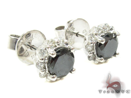 White gold round cut black diamond earrings with prong-set white diamond halo