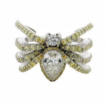 Silver wrap-around spider ring with pear-shaped and round diamond accents.