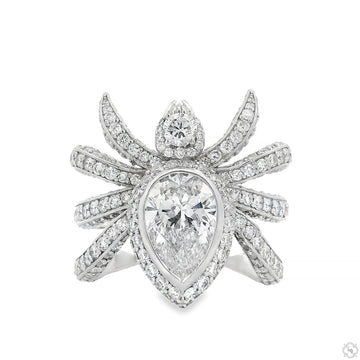 Men's wrap around spider diamond ring in yellow gold – round and pear-cut diamonds tracing spider legs and body around band