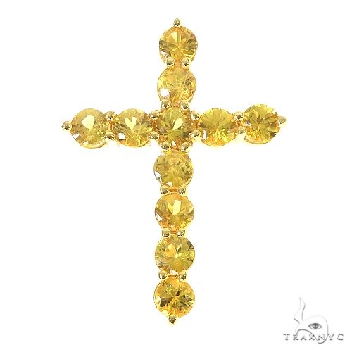Yellow round cut sapphire cross pendant with prong-set gemstones and polished gold setting