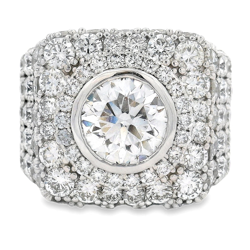 Square white gold men's pinky ring with central round diamond and pave diamond halo