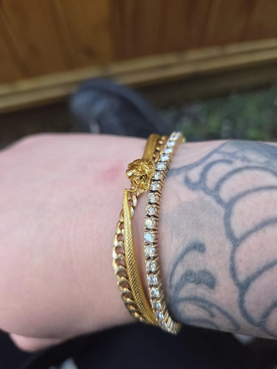 Gold snake bracelet with tennis bracelet, worn by Brent L.