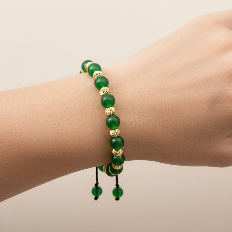 Adjustable men's bracelet with green agate and textured gold beads on black cord.