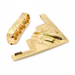 Gold four-finger ring with engraved B-2 bomber design and smooth polished finish.