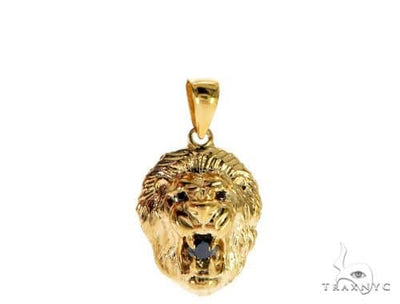 Yellow gold lion head pendant with black diamond eyes and detailed mane design.