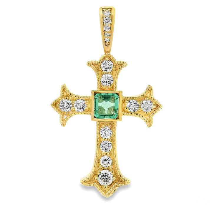 Small gold cross pendant with cushion-cut emerald center, ruby and sapphire accents, round diamonds, and milgrain edges