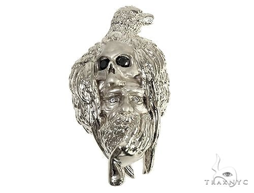 Sterling silver crow skull face pendant with black diamond prong settings, front-facing angle