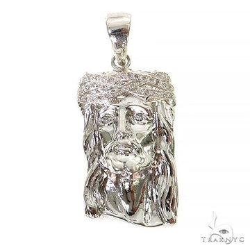 Sterling silver small Jesus pendant with diamond accents — front-facing detail view