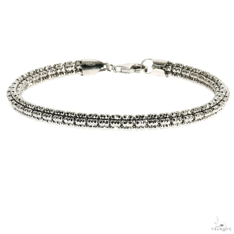 7.5-inch .925 silver iced link bracelet with lobster clasp and textured links