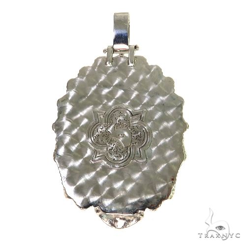 Oval textured .925 silver pendant with intricate floral design and ruby accent, men's jewelry